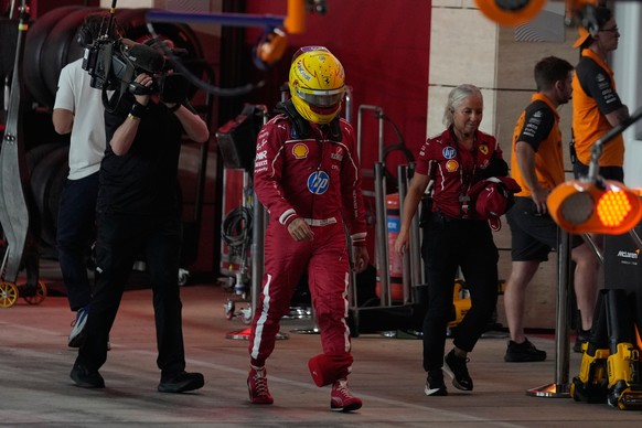 Ferrari driver Lewis Hamilton of Britain walks through the pit lame during the sprint qualifying for the Formula One Qatar Grand Prix in Friday, Nov. 28, 2025. (AP Photo/Altaf Qadri, Pool)
Qatar F1 GP ...