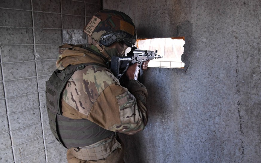 DPR Russia Ukraine Military Operation Wagner Group 8269924 06.09.2022 A service member of Russian private military company Wagner Group is seen at a position on a captured checkpoint, as Russia s mili ...