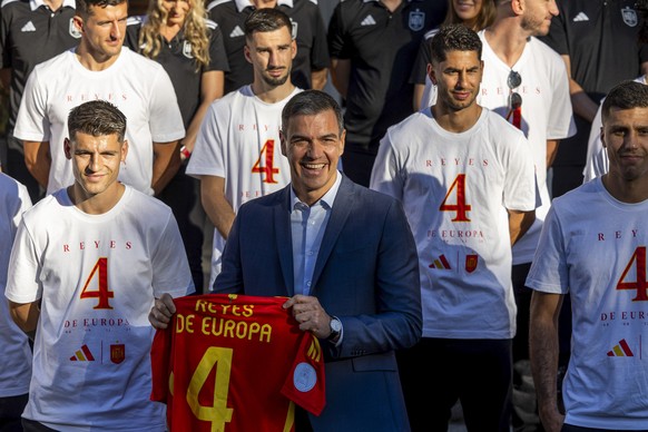 epa11480334 Spain&#039;s Prime Minister Pedro Sanchez poses for the photographers during the reception of Spain&#039;s national soccer team following their UEFA EURO 2024 victory, at La Moncloa Palace ...