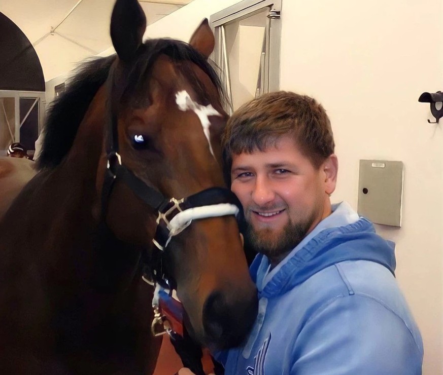 An older photo of Ramzan Kadyrov with his stallion Zazou.