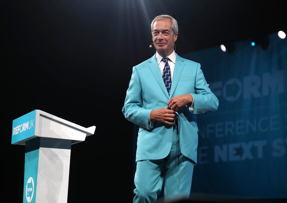 epa12355236 Leader of Reform UK Nigel Farage gestures during day one of the Reform UK annual conference in Birmingham, Britain, 05 September 2025. The Reform UK Conference 2025 takes place at the NEC  ...