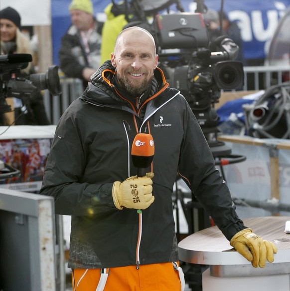 TV ski expert and former ski racer Marco Buechel of Liechtenstein poses in the finish area, after the Downhill race of the FIS Alpine Ski World Cup season at the Lauberhorn, in Wengen, Switzerland, Sa ...