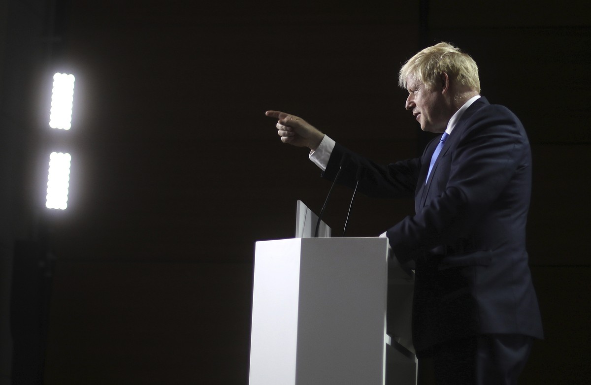 Britain's Prime Minister Boris Johnson gestures as he speaks during a press conference on the third and final day of the G-7 summit in Biarritz, France Monday, Aug. 26, 2019. (AP Photo/Markus Sch ...