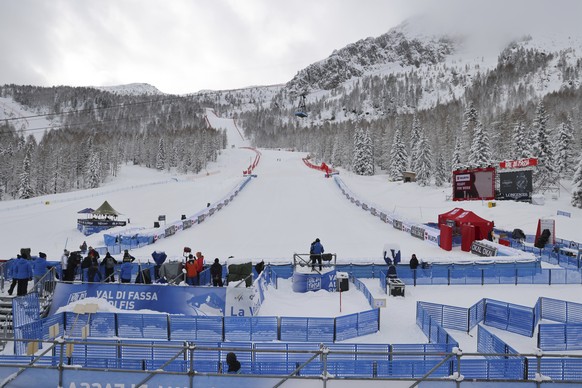 A view of the finish area as an alpine ski, women&#039;s World Cup super G race, was cancelled due to the excess of snow in Val di Fassa, Italy, Saturday, Feb. 24, 2024. (AP Photo/Marco Trovati)