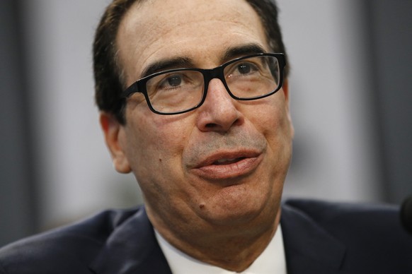 Treasury Secretary Steven Mnuchin testifies before a House Appropriations subcommittee hearing, Tuesday, April 9, 2019, on Capitol Hill in Washington. Mnuchin said Tuesday that his department intends  ...