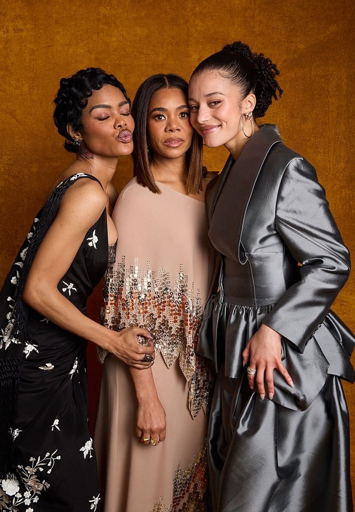LOS ANGELES, CALIFORNIA - DECEMBER 09: (L-R) Teyana Taylor, Regina Hall and Chase Infiniti pose in the IMDb Exclusive Portrait Studio at the Critics Choice Association 8th Annual Celebration of Black  ...