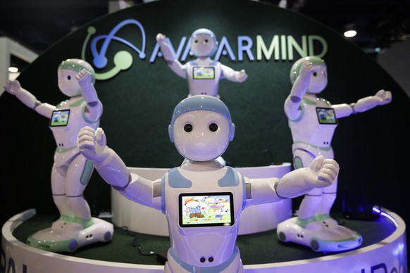 AvatarMind&#039;s iPal companion robots are displayed at CES International, Wednesday, Jan. 10, 2018, in Las Vegas. (AP Photo/Jae C. Hong)