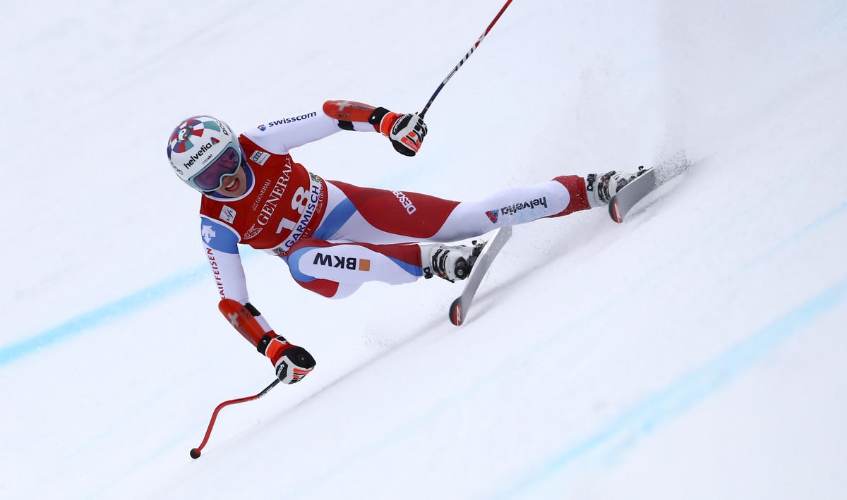 Switzerland's Michelle Gisin speeds down the course of an alpine ski, women's World Cup super-G race in Garmisch-Partenkirchen, Germany, Monday, Feb. 1, 2021. (AP Photo/Marco Trovati)