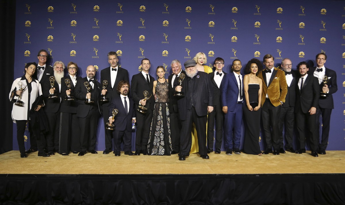 IMAGE DISTRIBUTED FOR THE TELEVISION ACADEMY - George R.R. Martin and the cast and crew of "Game of Thrones" pose in the press room with the award for outstanding drama series for "Game ...