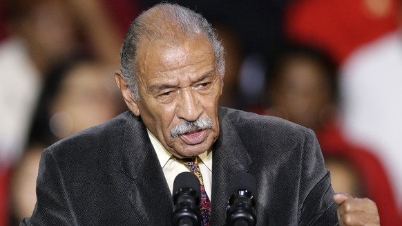 FILE - In this Nov. 1, 2014, file photo, Rep. John Conyers, D-Mich., speaks at Wayne State University in Detroit. Democrats have been quick to support the “me too” chorus of women _ and some men _ who ...