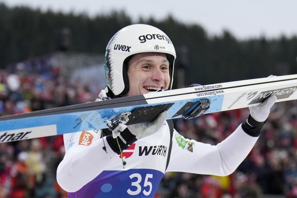 Domen Prevc, of Slovenia, celebrates after winning the gold medal in the ski jumping men&#039;s large hill individual competition at the Nordic World Ski Championships in Trondheim, Norway, Saturday,  ...