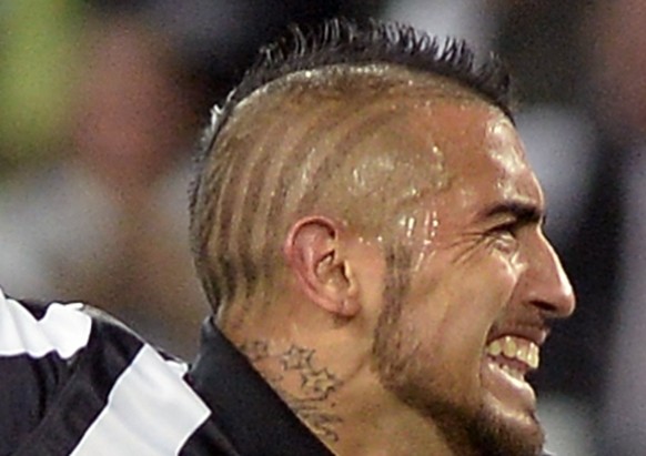 Juventus' Arturo Vidal celebrates after scoring his side's first goal during the Champions League, quarterfinal, first leg soccer match between Juventus and Monaco, at the Juventus Stadium in Turin, Italy, Tuesday, April 14, 2015. (AP Photo/Massimo Pinca)