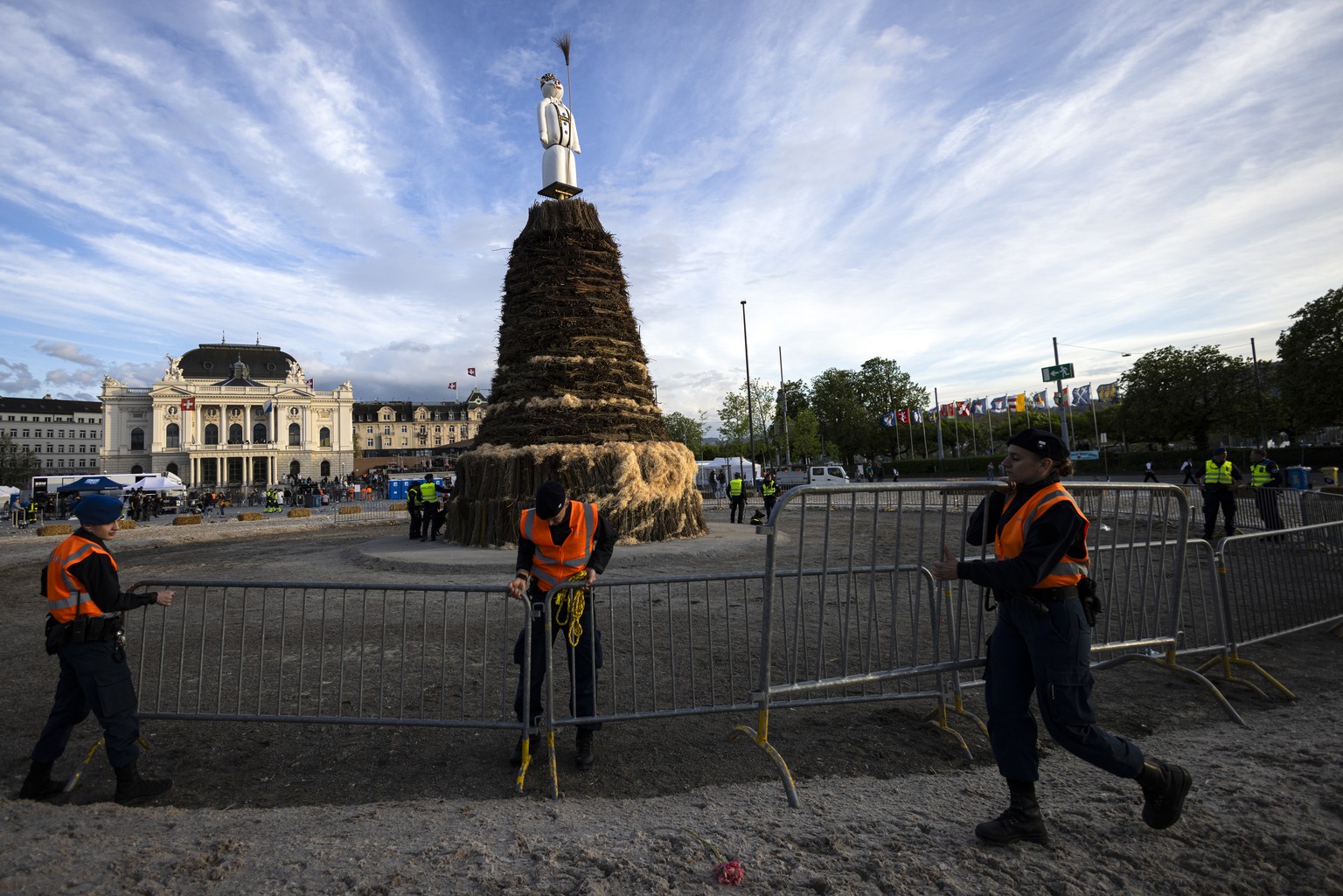 The &quot;Boeoegg&quot; is seen on the Sechselaeuten square in Zurich as security guards cordon off the square in Zurich, Switzerland, on Monday April 15, 2024. The Sechselaeuten (ringing of the six o ...