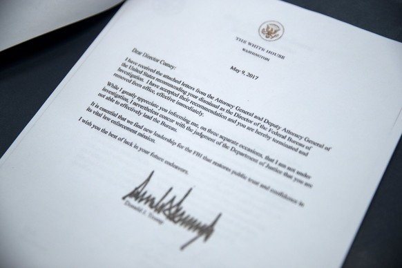 epa05953749 A copy of the letter sent to FBI Director James Comey from US President Donald J. Trump informing him that he has been terminated at the White House in Washington, DC, USA, 09 May 2017. EP ...