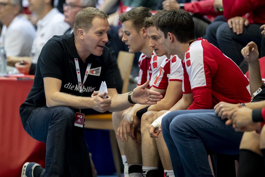 Switzerland&#039;s head coach Michael Suter, left, reacts during the 2020 Men&#039;s European Championship qualification game between Switzerland and Belgium at the BBC Arena in Schaffhausen, Switzerl ...