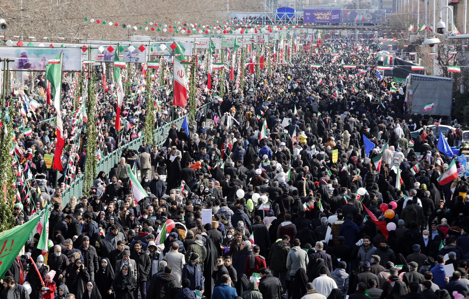 epa10460363 Iranians celebrate the 44th anniversary of the 1979 Islamic Revolution, in Azadi (Freedom) Square in Tehran, Iran, February 11, 2023. The event marks the 44th anniversary of the ...