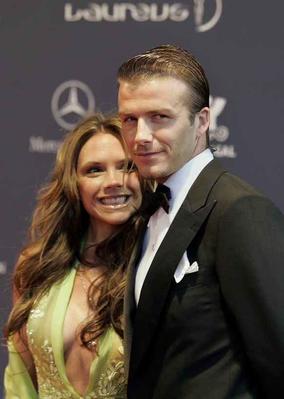 English soccer star David Beckham and his wife Victoria arrive for the Laureus World Sports Awards ceremony Monday, May 16 2005, at the Estoril Casino, outside Lisbon, Portugal. (AP Photo/Armando Fran ...