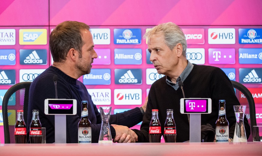 09.11.2019, Bayern, München: Fußball: Bundesliga, Bayern München - Borussia Dortmund, 11. Spieltag in der Allianz Arena. Interimstrainer Hansi Flick vom FC Bayern München (l) und Trainer Lucien Favre  ...