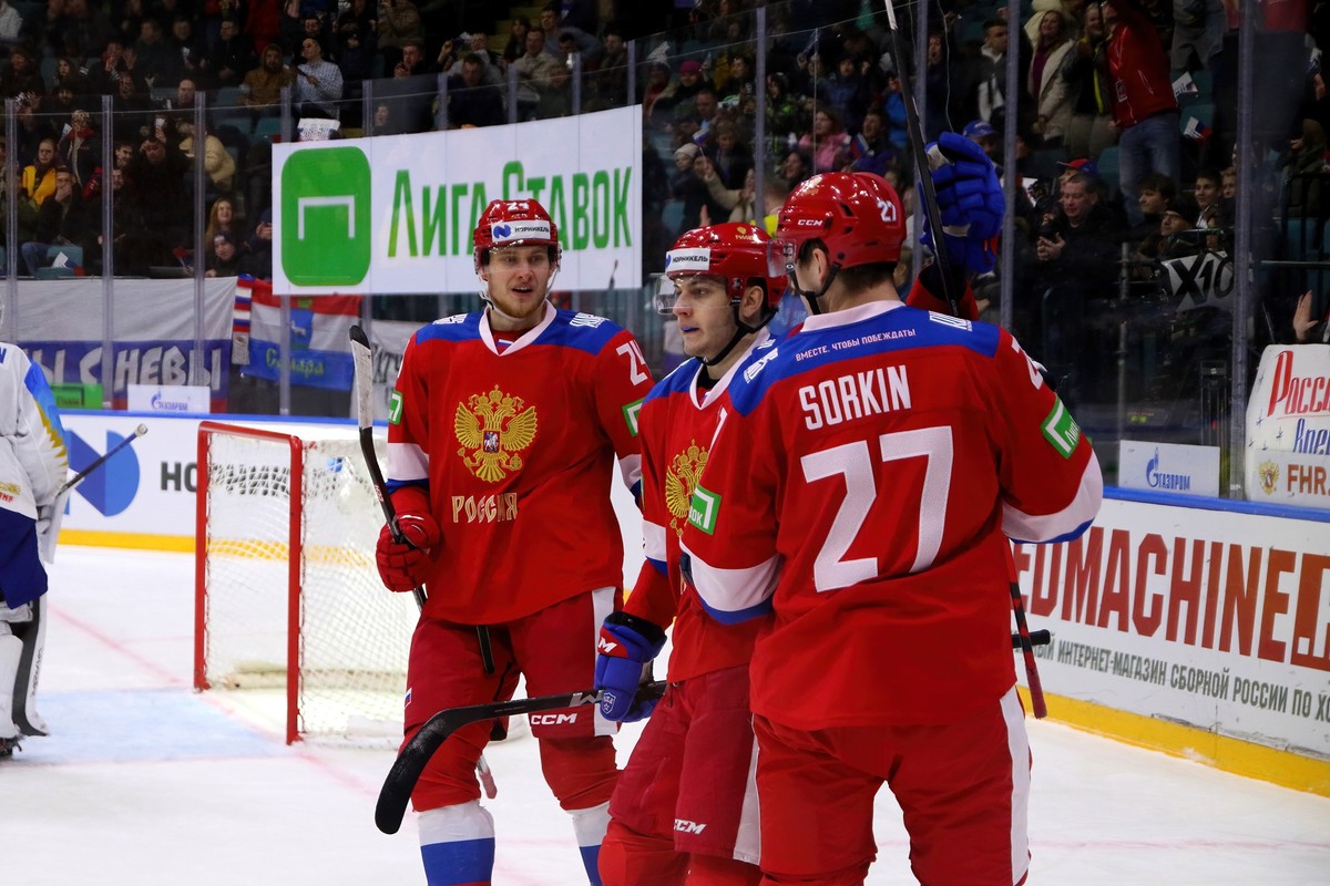 SAINT PETERSBURG, RUSSIA - 2023/12/17: Russia 25 national hockey team player, Ilya Safonov (L), Nikolai Polyakov (C), Maxim Sorkin (R) seen in action during the Channel One Cup (ice hockey) between Ru ...