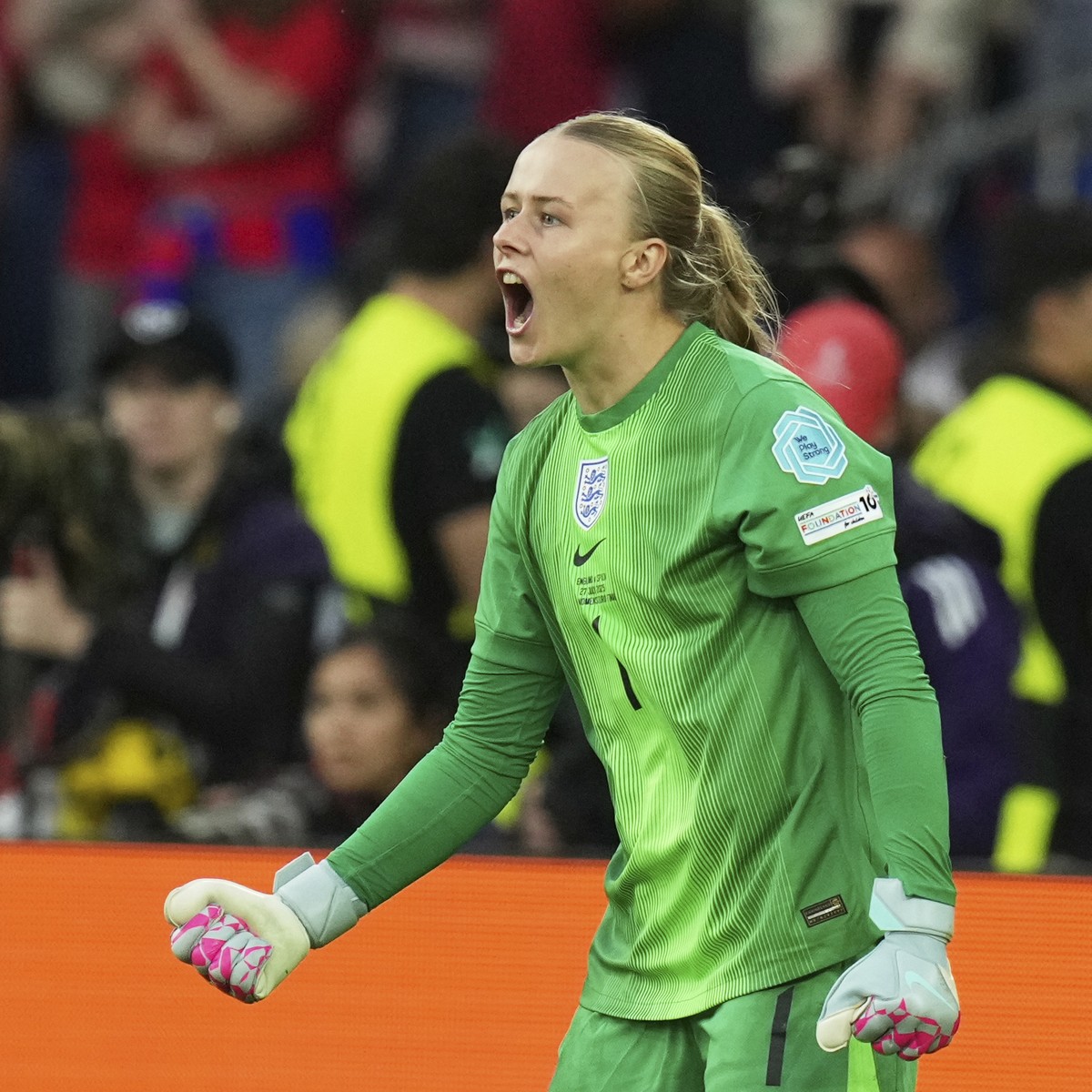 England goalkeeper Hannah Hampton reacts after a save during a penalty shootout at the end of the Women's Euro 2025 final soccer match between England and Spain at St. Jakob-Park in Basel, Switze ...