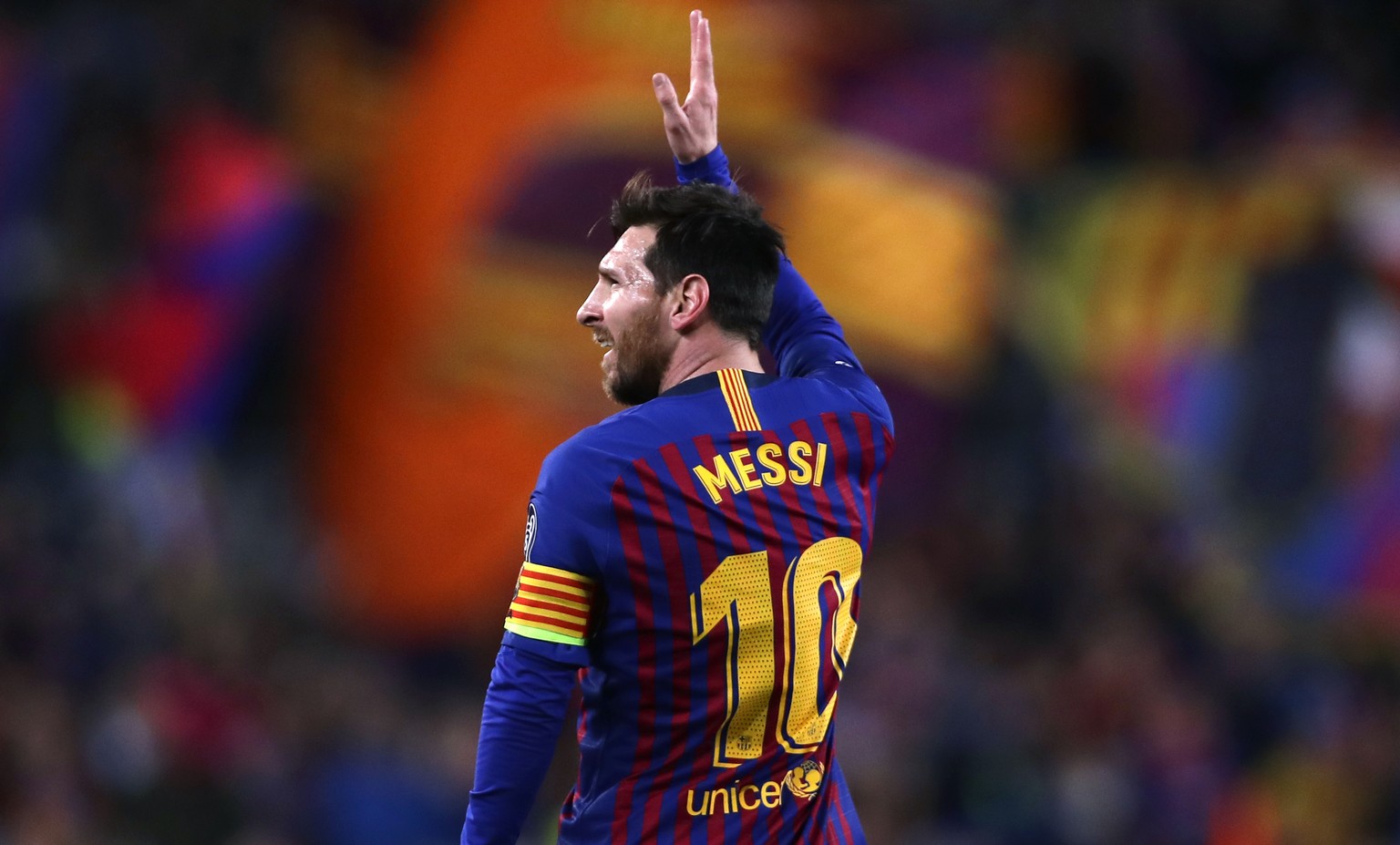 FILE - In this April 16, 2019 file photo Barcelona forward Lionel Messi celebrates after scoring his side&#039;s second goal during the Champions League quarterfinal, second leg, soccer match between  ...