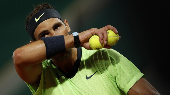 epa09246324 Rafael Nadal of Spain in action against Richard Gasquet of France during their second round match at the French Open tennis tournament at Roland Garros in Paris, France, 03 June 2021. EPA/ ...