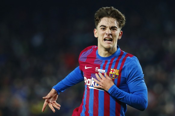 Barcelona's Gavi celebrates after scoring his side's second goal during the Spanish La Liga soccer match between Barcelona and Elche at the Camp Nou stadium, in Barcelona, Spain, Saturday, D ...