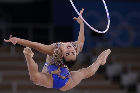 Linoy Ashram, of Israel, competes in the individual all-around rhythmic gymnastics final at the 2020 Summer Olympics, Saturday, Aug. 7, 2021, in Tokyo, Japan. Ashram won the gold medal in the event. (AP Photo/Gregory Bull)