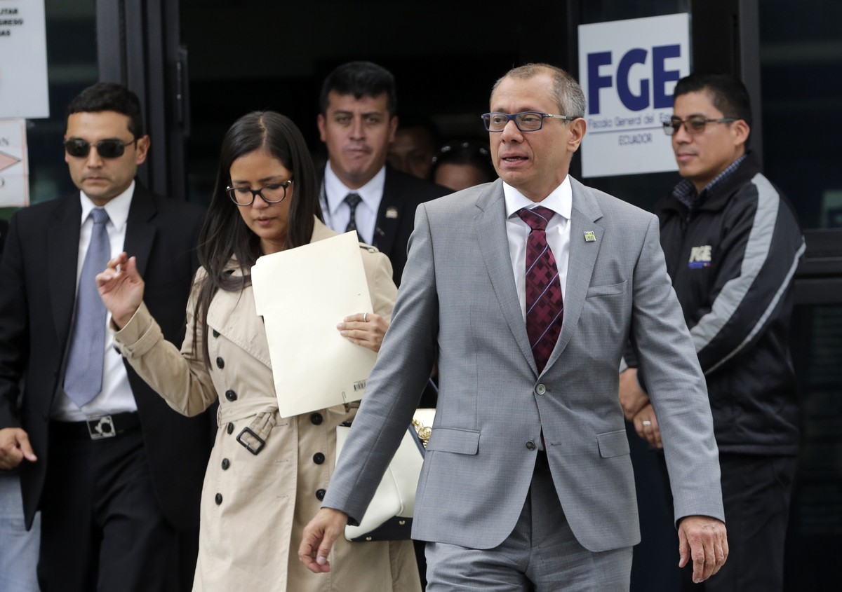 FILE - Ecuador's Vice President Jorge Glas leaves the General Attorney's Office after making a voluntary statement regarding his alleged connection with two corruption cases in Quito, Ecuado ...
