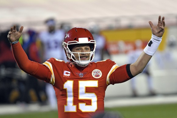 Kansas City Chiefs quarterback Patrick Mahomes celebrates at the end of the AFC championship NFL football game against the Buffalo Bills, Sunday, Jan. 24, 2021, in Kansas City, Mo. The Chiefs won 38-2 ...