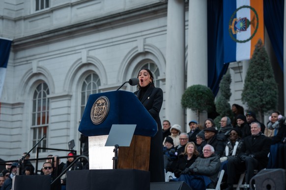 epa12621084 US Representative Alexandria Ocasio-Cortez speaks during New York City Mayor Zohran Mamdanis inauguration in New York, New York, USA, 01 January 2026. EPA/TAURAT HOSSEIN
