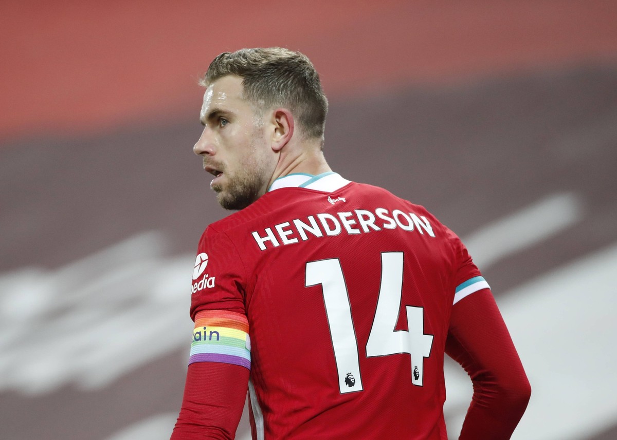 Liverpool v Wolverhampton Wanderers - Premier League - Anfield Liverpool s Jordan Henderson wears a rainbow coloured captain s armband in support of the Rainbow Laces campaign during the Premier Leagu ...