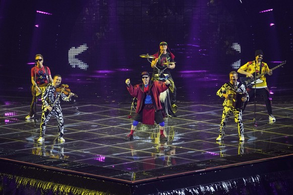 Zdob si Zdub &amp; Advahov Brothers from Moldova singing Trenuletul perform during the first semi final at the Eurovision Song Contest in Turin, Italy, Tuesday, May 10, 2022. (AP Photo/Luca Bruno)