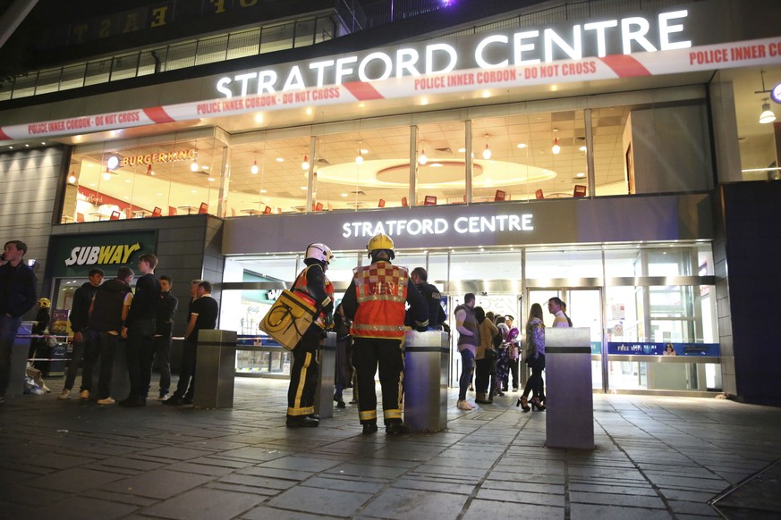 Emergency services at Stratford Centre in east London, following a suspected noxious substance attack where six people have been reported injured, Saturday Sept. 23, 2017. One man has been arrested on ...