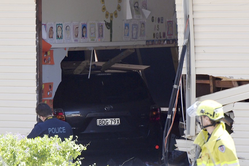 epa06312456 Police and paramedics operate at the scene of a vehicle accident at the at Banksia Road Primary School in Greenacre, Sydney, Australia, 07 November 2017. According to media reports, seven  ...