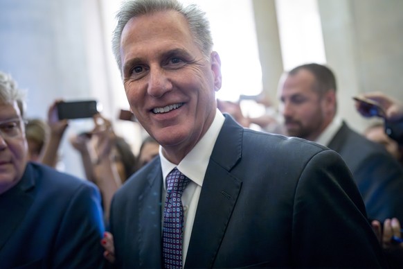 House Speaker Kevin McCarthy, R-Calif., returns to office after talking to reporters about debt limit negotiations ahead of his meeting with President Joe Biden at the U.S. Capitol in Washington…
