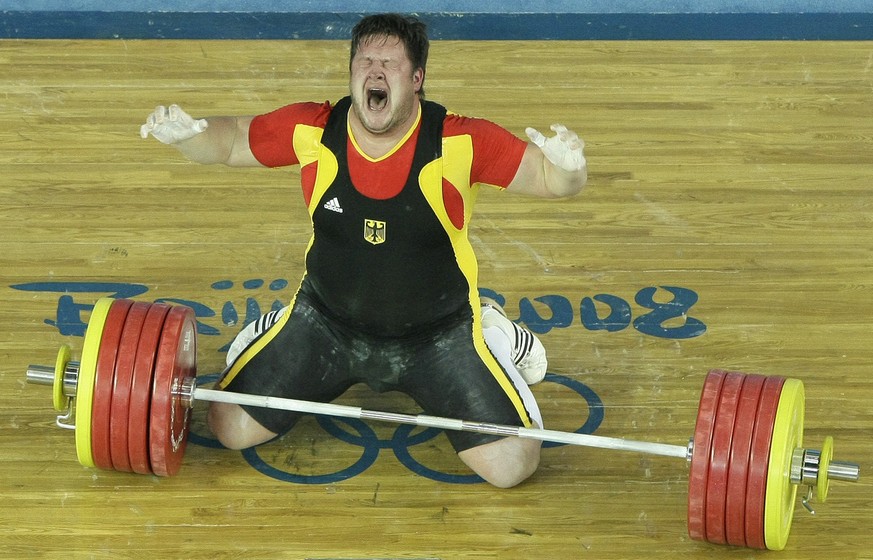 Gold medalist, Matthias Steiner of Germany celebrates a successful lift in the men&#039;s +105 kg, weightlifting competition at the Beijing 2008 Olympics in Beijing, Tuesday, Aug. 19, 2008. He won the ...