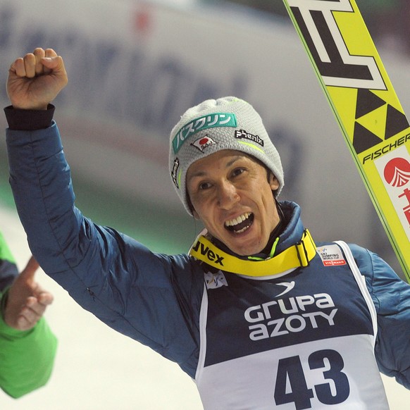 Japan&#039;s Noriaki Kasai celebrates his third place in the 34th World Cup Ski Jumping competition, in Wisla, Poland, Friday, March 4, 2016. (AP Photo/Alik Keplicz)