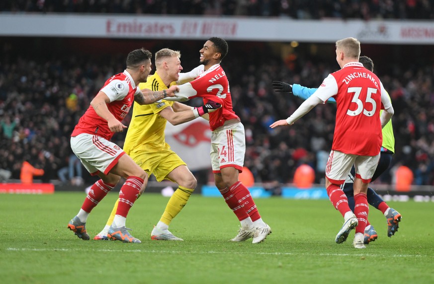 epa10503114 Arsenal&#039;s Reiss Nelson celebrates scoring their third goal with team mates during the English Premier League soccer match between Arsenal London and AFC Bournemouth in London, Britain ...