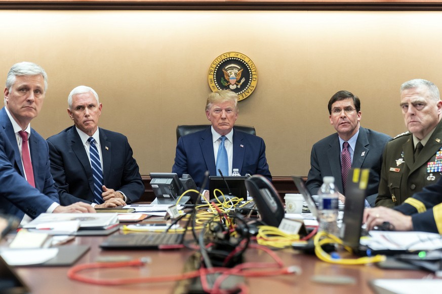 In this image released by the White House, President Donald Trump is joined by Vice President Mike Pence, second from left, national security adviser Robert OÄôBrien, left; Secretary of Defense Mark  ...