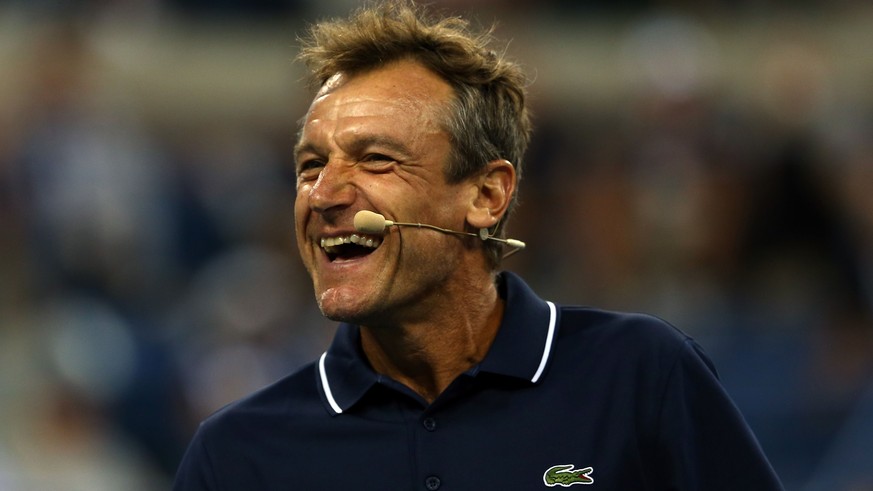 NEW YORK, NY - SEPTEMBER 04: Mats Wilander of Sweden looks on during an exhibition doubles match against James Blake and John McEnroe of the United States on Day Eleven of the 2014 US Open at the USTA ...