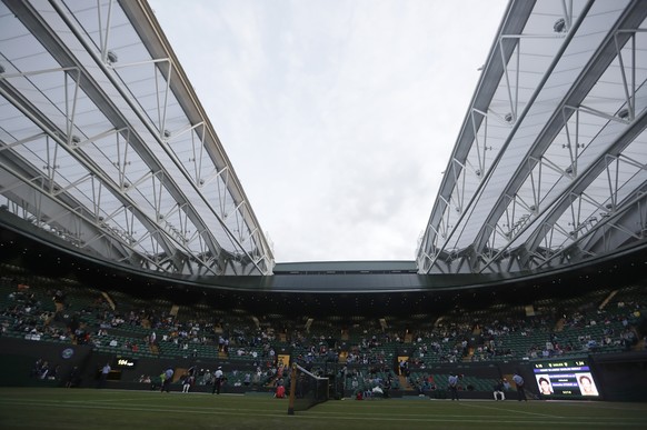 The roof on Court number one closes for the Women&#039;s singles match between United States&#039; Alison Riske and Croatia&#039;s Donna Vekic during day two of the Wimbledon Tennis Championships in L ...