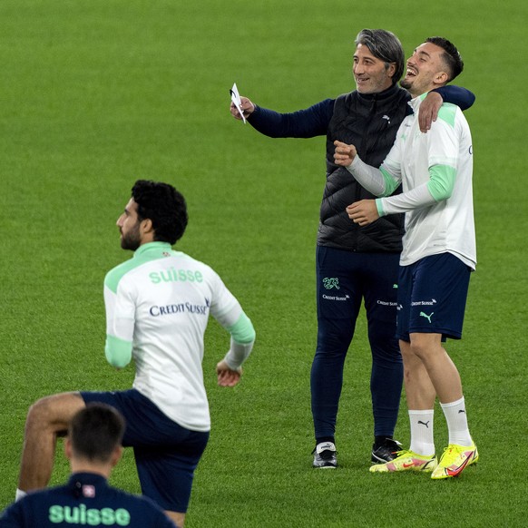 epa09576581 Switzerland&#039;s head coach Murat Yakin (2-R) and Andi Zeqiri (R) attend their team&#039;s training session in Rome, Italy, 11 November 2021. Switzerland will face Italy in their FIFA Wo ...