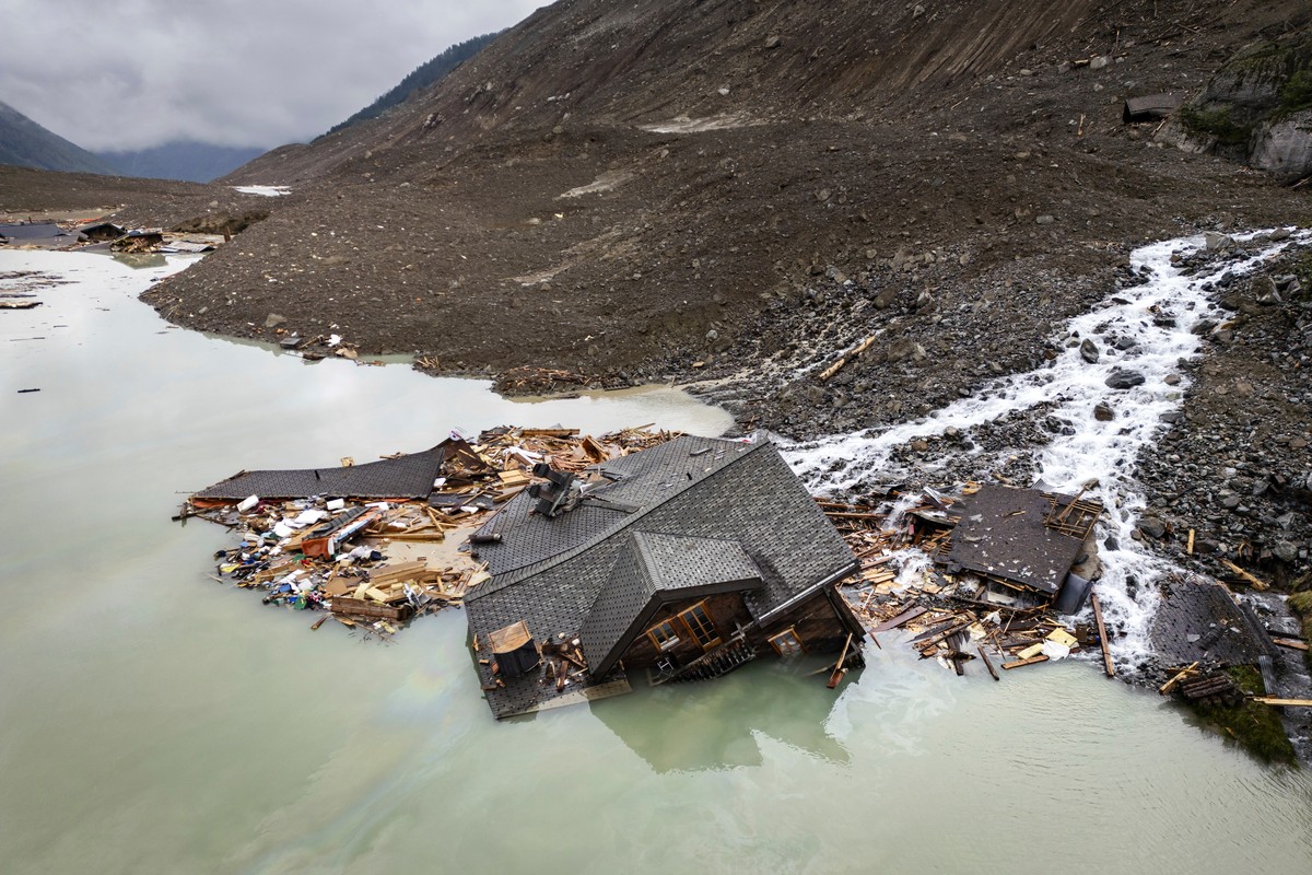 A destroyed house in the water from the river Lonza after the formation of a lake on the last houses of the village of Blatten collapsed after a massive avalanche, triggered by the collapse of the Bir ...