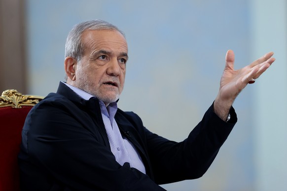 epa12335124 A handout picture made available by the Iranian presidential office official on 29 August 2025, shows Iranian president Masoud Pezeshkian during a recorded TV interview in Tehran, Iran. Pe ...