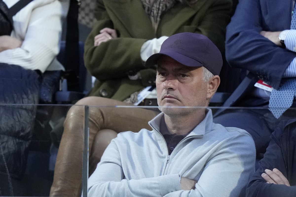 Roma coach Jose Mourinho looks a tennis match between Serbia's Novak Djokovic and Argentina's Tomas Etcheverry at the Italian Open tennis tournament, in Rome, Friday, May 12, 2023. (AP Photo ...