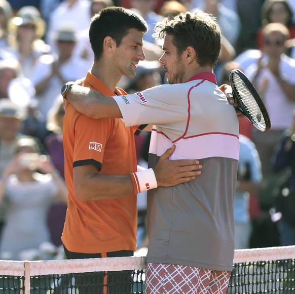 Wawrinka defeats Djokovic in French Open final Stan Wawrinka of Switzerland (R) and Novak Djokovic of Serbia praise each other following the French Open final match on June 7, 2015, in Paris. Wawrinka ...