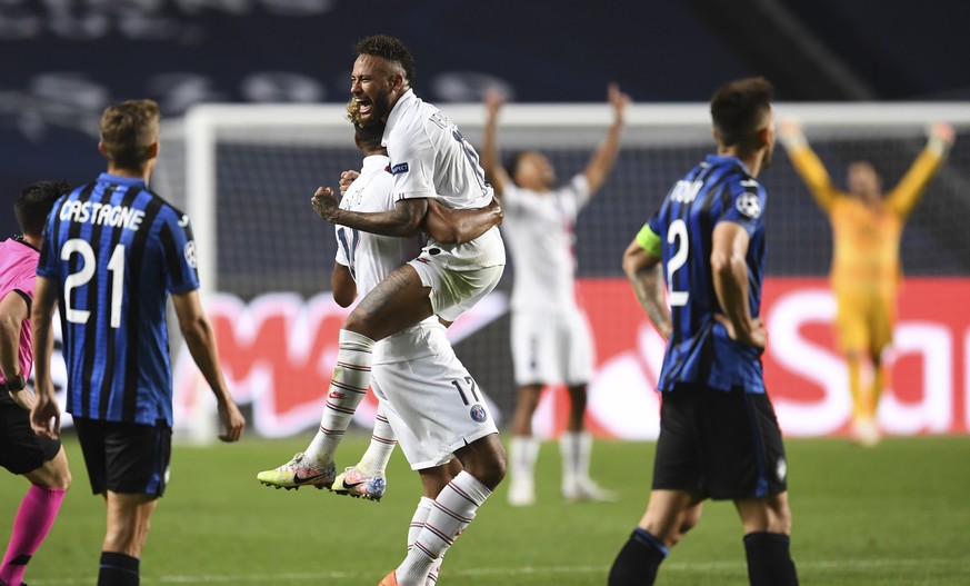 PSG&#039;s Neymar celebrates with teammate Eric Maxim Choupo-Moting after his team&#039;s win in the Champions League quarterfinal match between Atalanta and PSG at Luz stadium, Lisbon, Portugal, Wedn ...