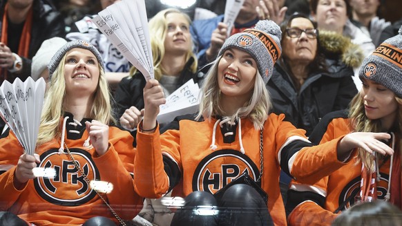 HPK&#039;s supporters celebrate during the game between Hameenlinna PK and Dinamo Riga at the 91th Spengler Cup ice hockey tournament in Davos, Switzerland, Wednesday, Dec. 27, 2017. (Melanie Duchene/ ...