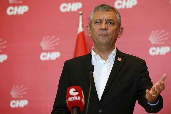 epa12984772 Republican People's Party (CHP) chairman Ozgur Ozel (L) attends a press conference at the CHP headquarters in Ankara, Turkey, 22 May 2026. The press conference follows a decision by t ...